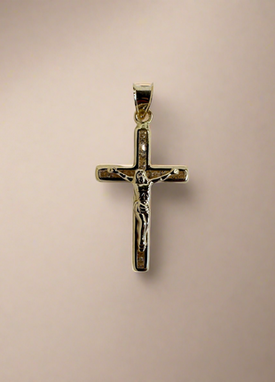 Gold cross with zircons