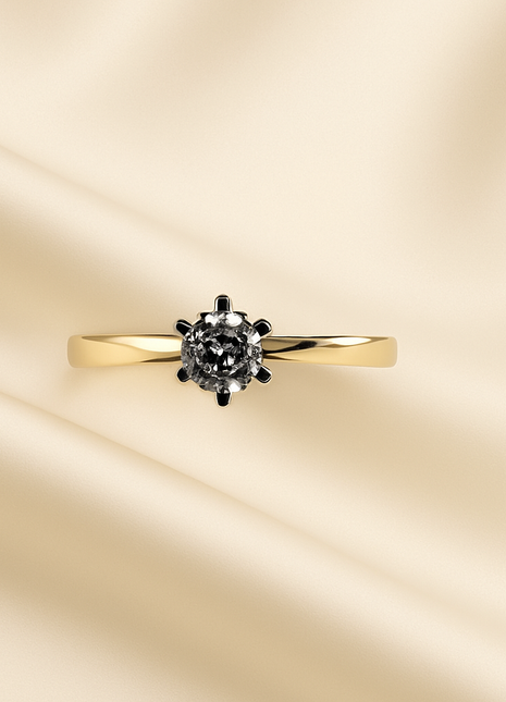 Ring with a brilliant in a classic crown