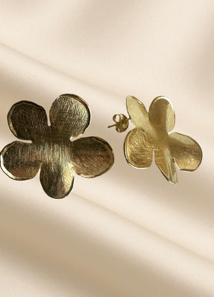Gold flower-shaped earrings