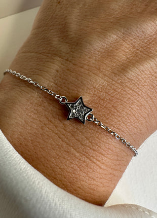 Silver bracelet with star