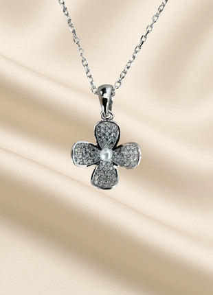 Silver necklace with flower-shaped pendant and zircons