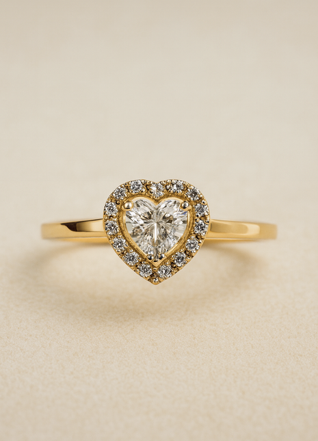 Gold ring with heart-shaped diamonds