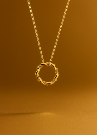 Zlatna ogrlica s dijamantima u pletenom krugu