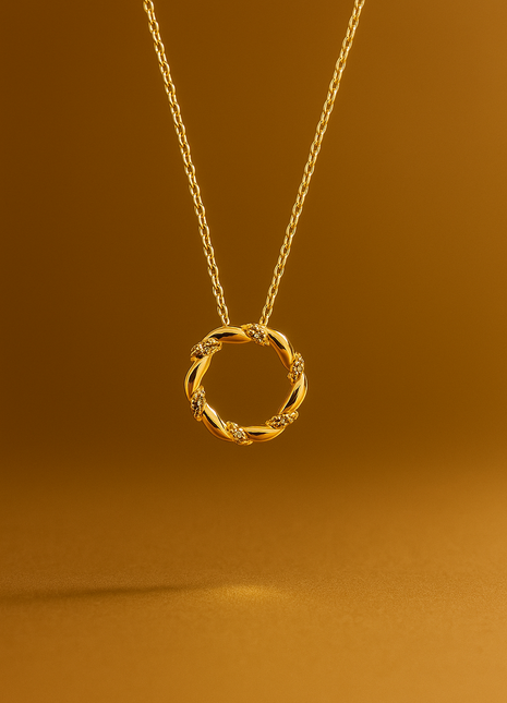 Zlatna ogrlica s dijamantima u pletenom krugu