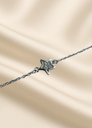 Silver bracelet with star