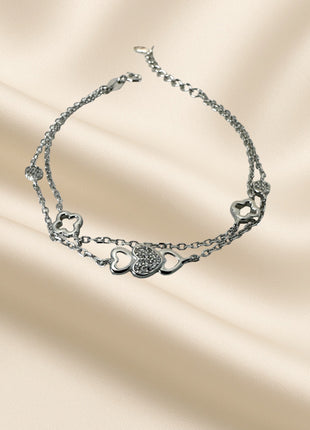 Double bracelet with heart and clover motifs
