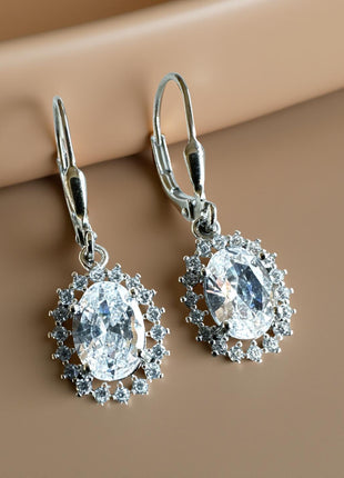 Silver earrings with oval zircon