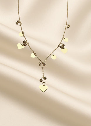 Zlatna ogrlica s privjescima u obliku srca