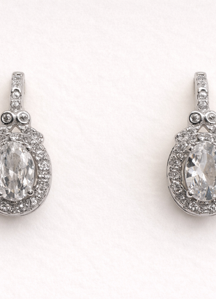Srebrne naušnice s ovalnim cirkonom i halo okvirom