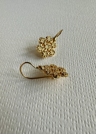 Silver earrings with gold plating in the shape of a flower