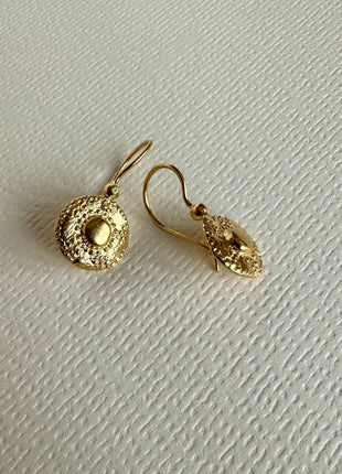 Silver earrings with gold plating and circular embossed design